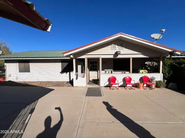 a view of a outdoor space with porch and patio