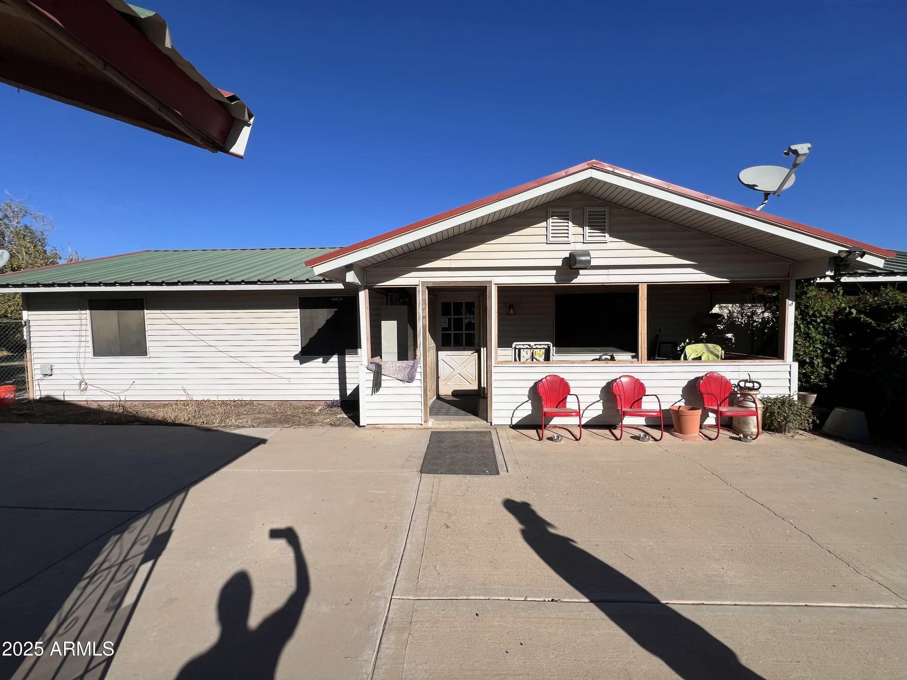 a view of a outdoor space with porch and patio