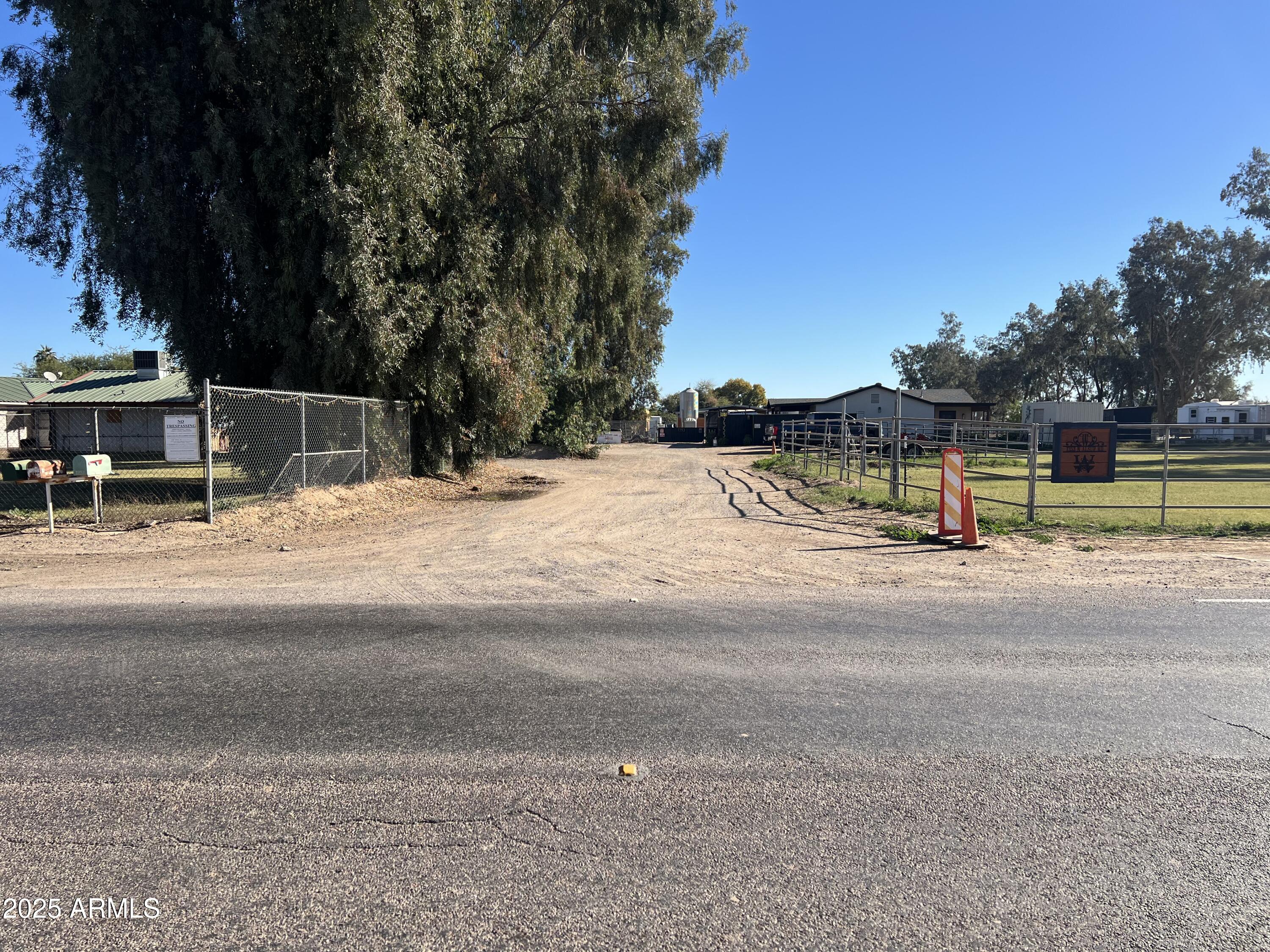 7431 North Alsup Road Litchfield Park, AZ 85340 - Photo 28 of 31 a view of street with houses