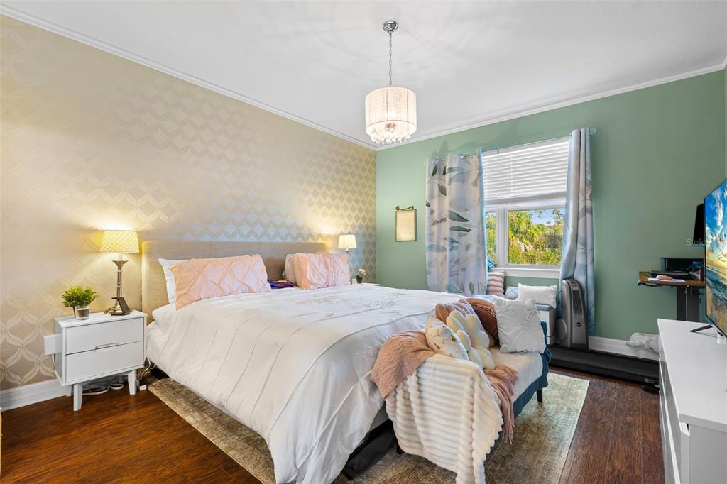 4730 111th Terrace East Parrish, FL 34219 - Photo 20 of 60 a bedroom with a bed and window