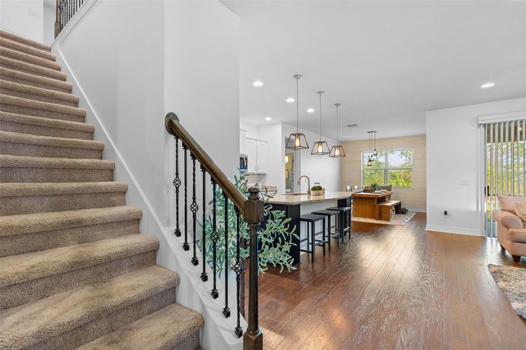 4730 111th Terrace East Parrish, FL 34219 - Photo 29 of 60 a view of entryway and hall with wooden floor