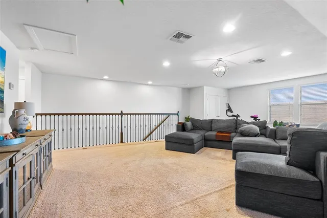 a view of a two chairs and table in patio with a garden