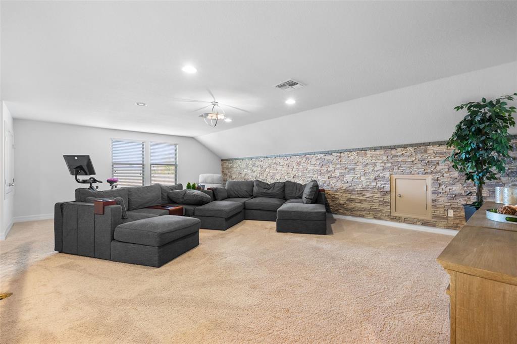 4730 111th Terrace East Parrish, FL 34219 - Photo 31 of 60 a living room with furniture and a potted plant