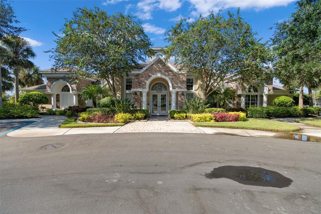 4730 111th Terrace East Parrish, FL 34219 - Photo 41 of 60 a view of road with card and trees