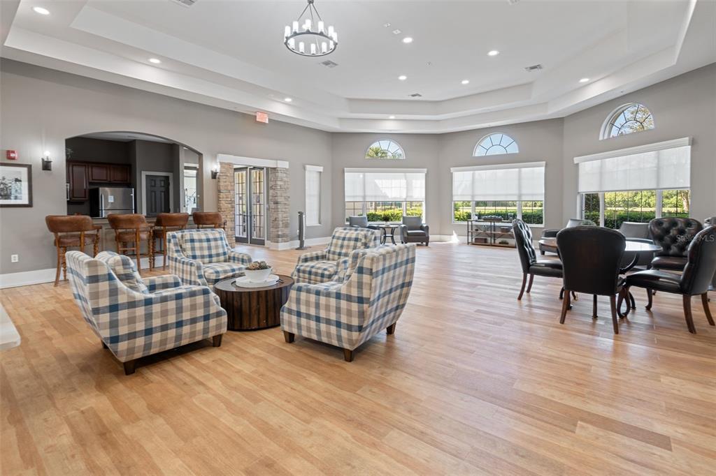 4730 111th Terrace East Parrish, FL 34219 - Photo 47 of 60 a living room with fireplace furniture and a wooden floor