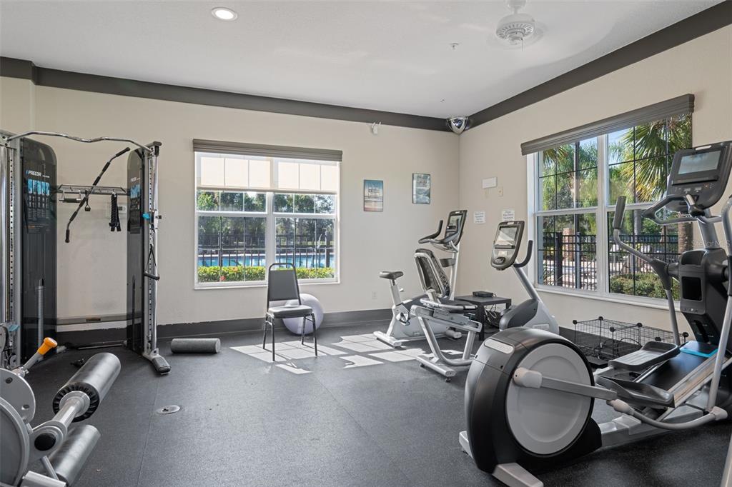 4730 111th Terrace East Parrish, FL 34219 - Photo 49 of 60 a room with gym equipment and a large window