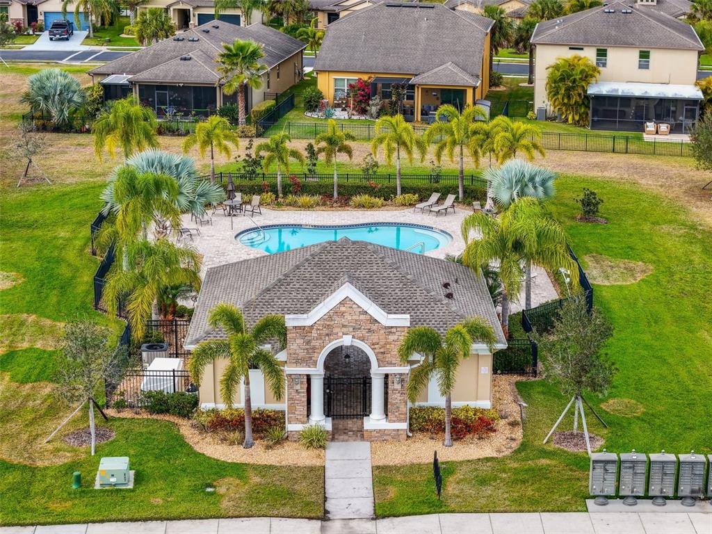 4730 111th Terrace East Parrish, FL 34219 - Photo 55 of 60 an aerial view of a house with a garden and plants