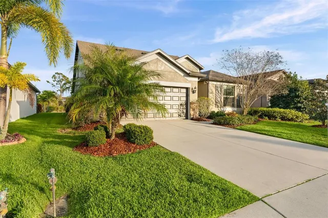 a backyard of a building with lots of green space