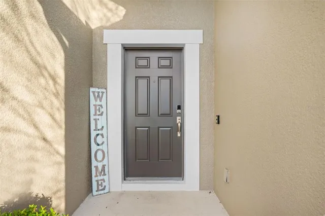 a kitchen with cabinets a sink a stove and wooden floor