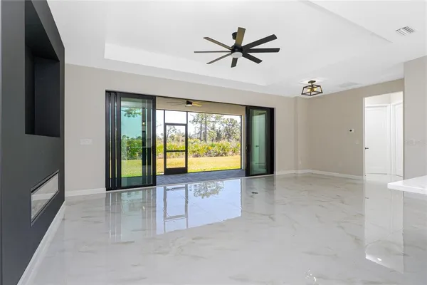 a view of an empty room and window