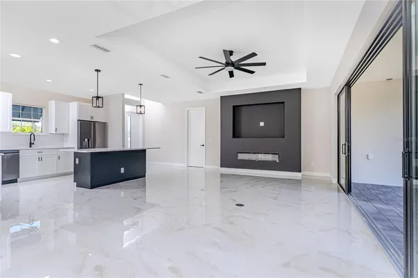 a view of a kitchen with a sink and a kitchen