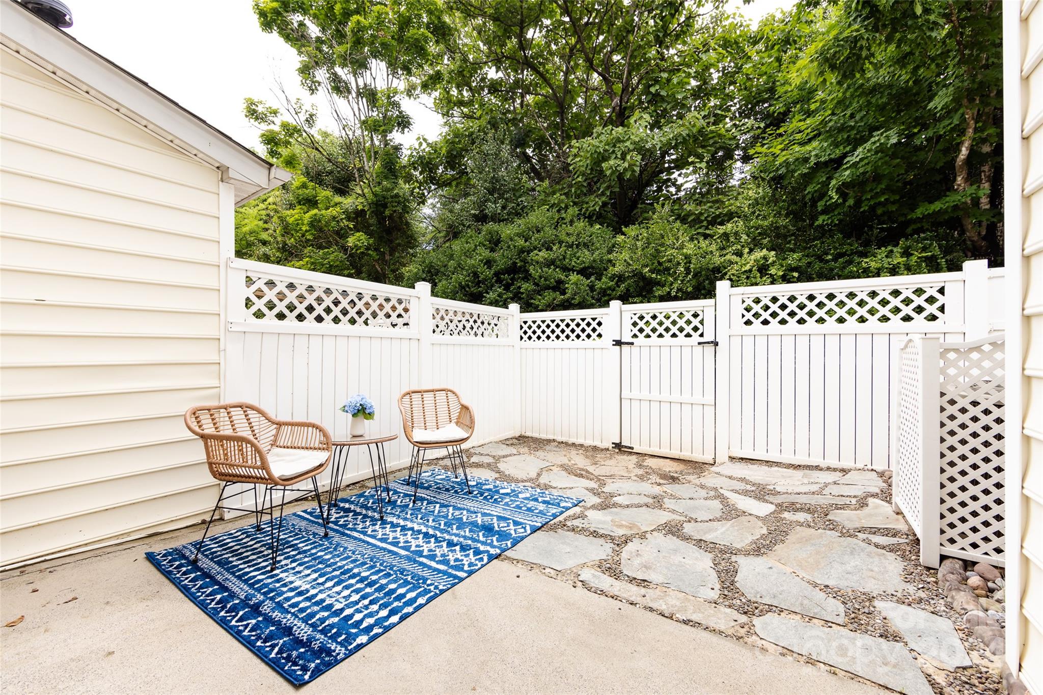 726 Shellstone Place Fort Mill, SC 29708 - Photo 29 of 31 a view of a patio with a chair