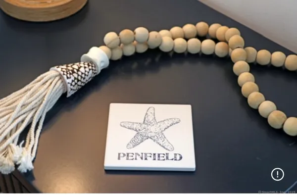 a front view of a couch with chairs