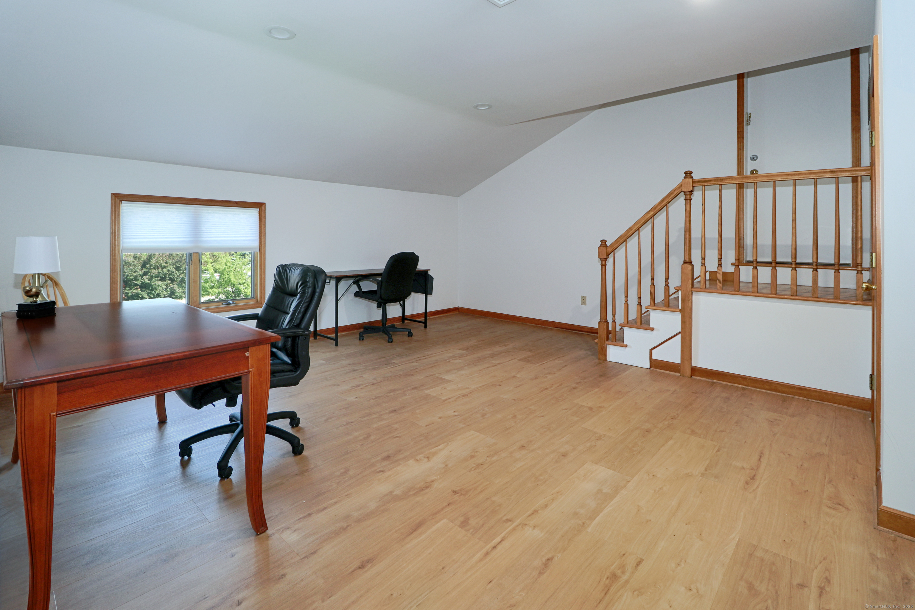 560 Fairfield Beach Road Fairfield, CT 06824 - Photo 26 of 38 a view of a livingroom with furniture and a window