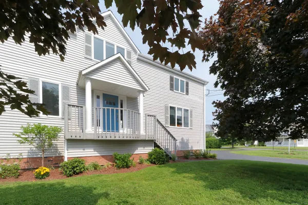 a view of backyard with garden and plants