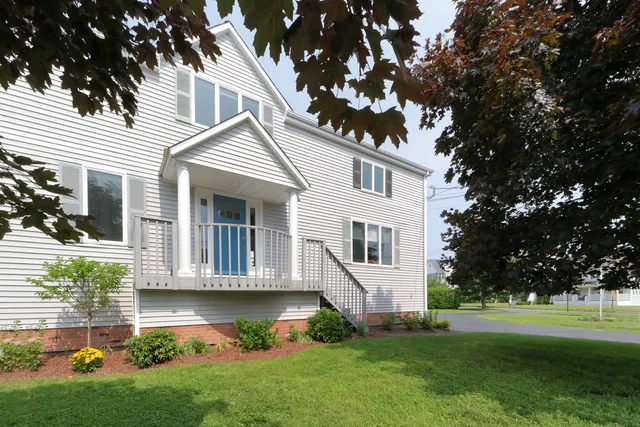 a view of backyard with garden and plants