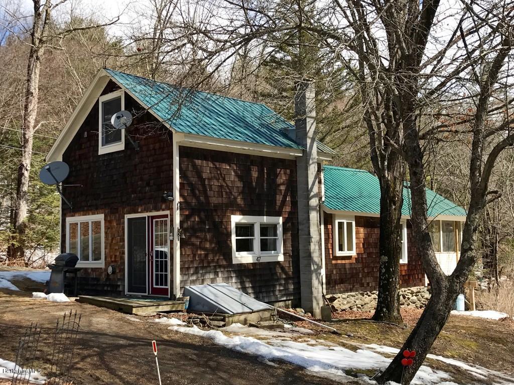 47 Thompson Road Colrain, MA 01340 - Photo 1 of 17 a front view of a house with street