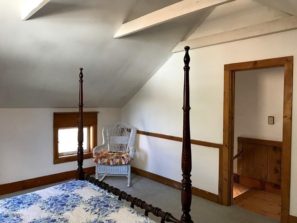 47 Thompson Road Colrain, MA 01340 - Photo 12 of 17 a bedroom with furniture window and wooden floor
