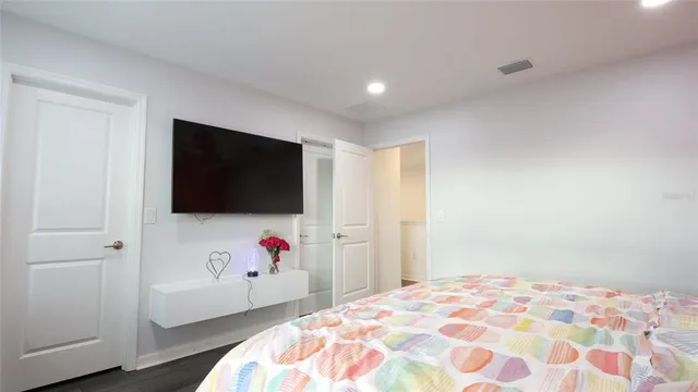 a room with a sink and a mirror