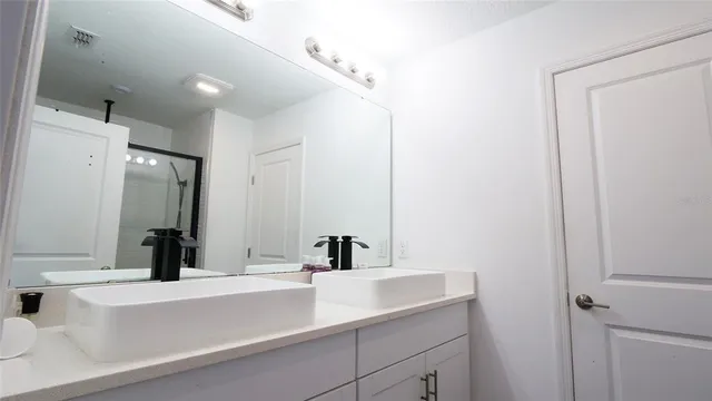 a view of a backyard with sitting area