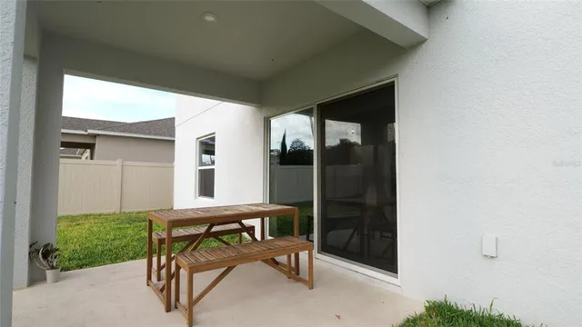 an aerial view of a house with a ocean view