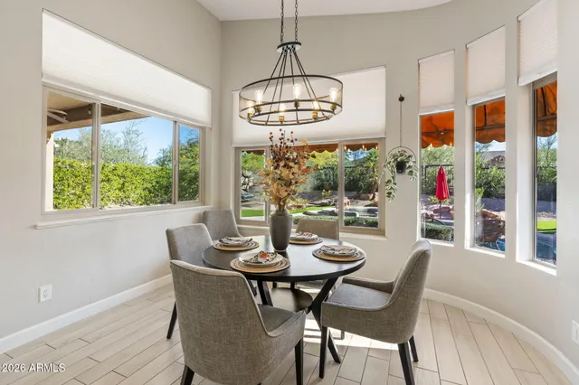 a kitchen with wooden cabinets and a sink