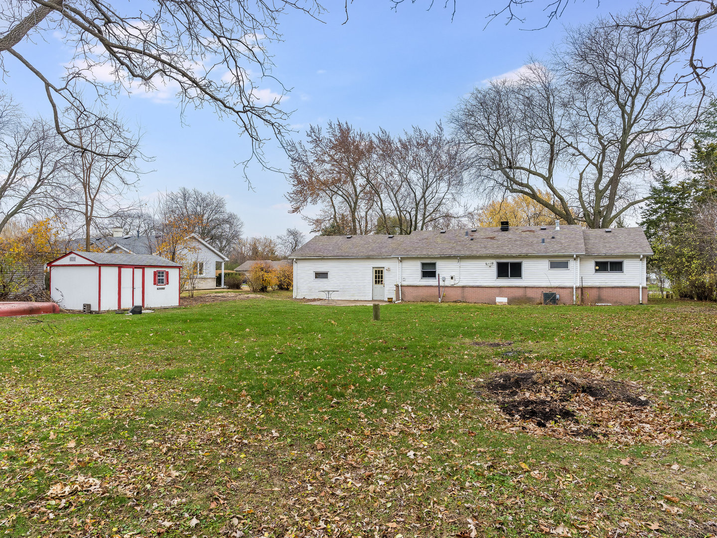 410 Aster Lane Hoffman Estates, IL 60169 - Photo 11 of 12 a view of house with yard