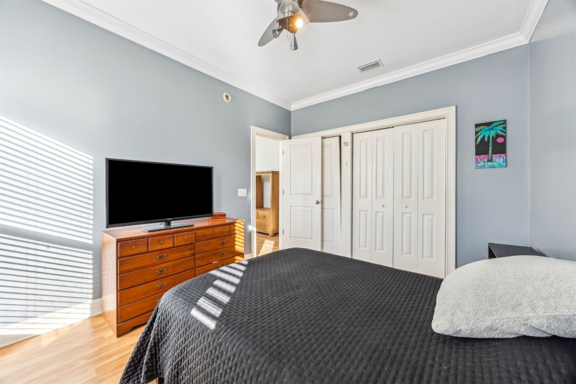 2513 Safe Harbor Lane Fernandina Beach, FL 32034 - Photo 33 of 54 a bedroom with a bed and a flat screen tv