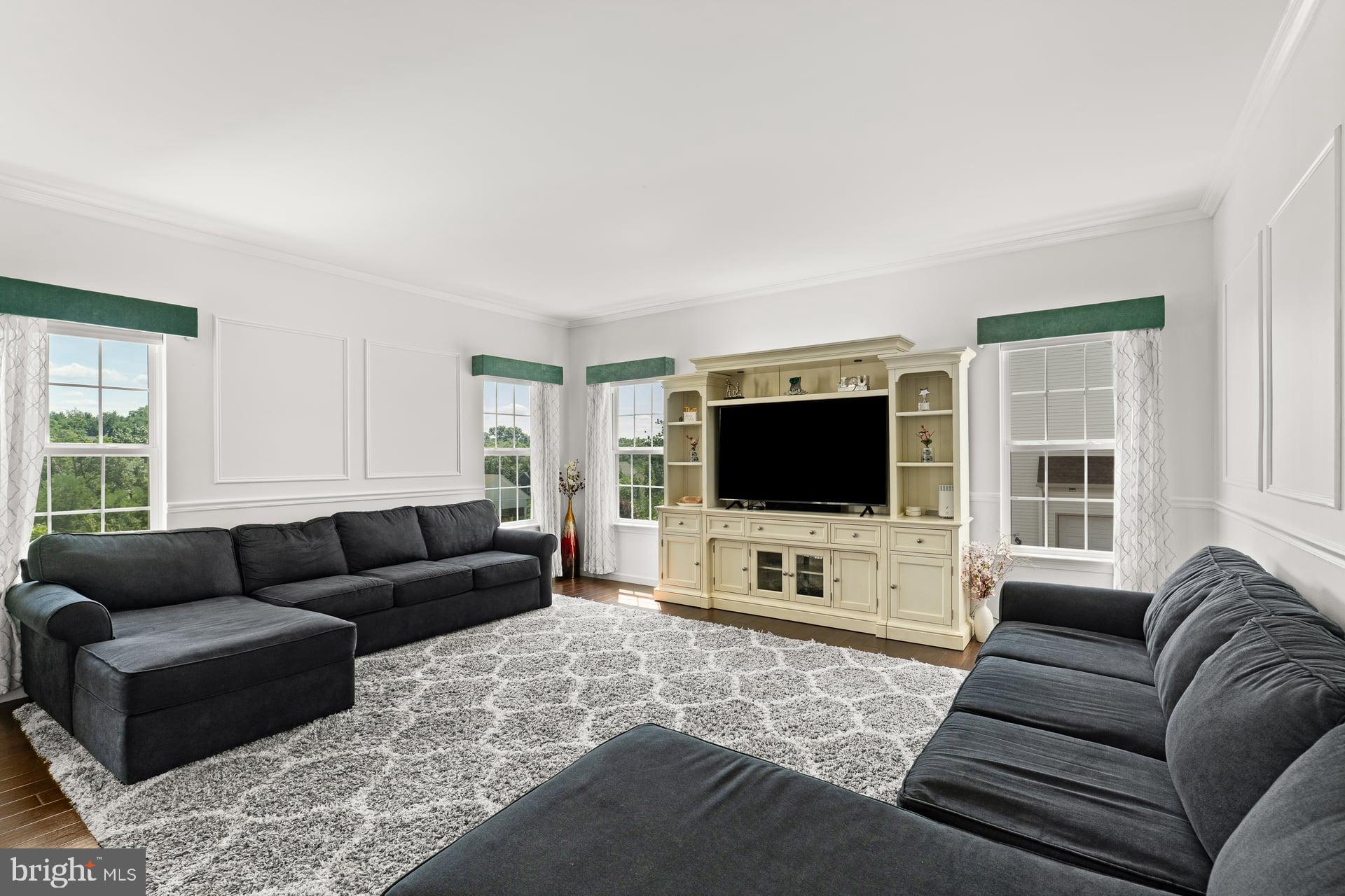 3 Rycroft Road Mechanicsburg, PA 17050 - Photo 15 of 44 Spacious living room with natural light.