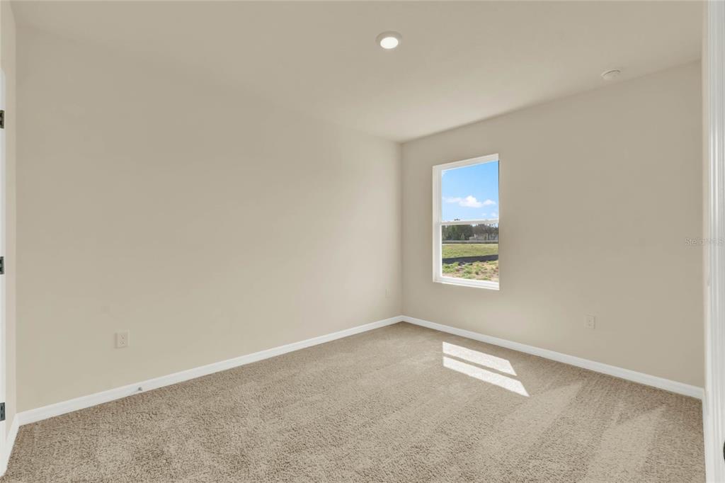 3517 Nettle Loop Tavares, FL 32778 - Photo 17 of 27 an empty room with a window