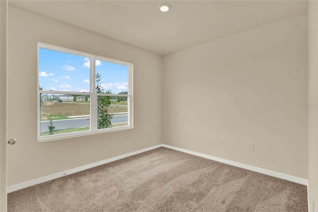 3517 Nettle Loop Tavares, FL 32778 - Photo 19 of 27 an empty room with a window