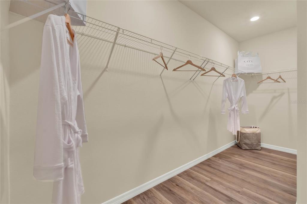 3517 Nettle Loop Tavares, FL 32778 - Photo 25 of 27 a view of a room with wooden floor and shower