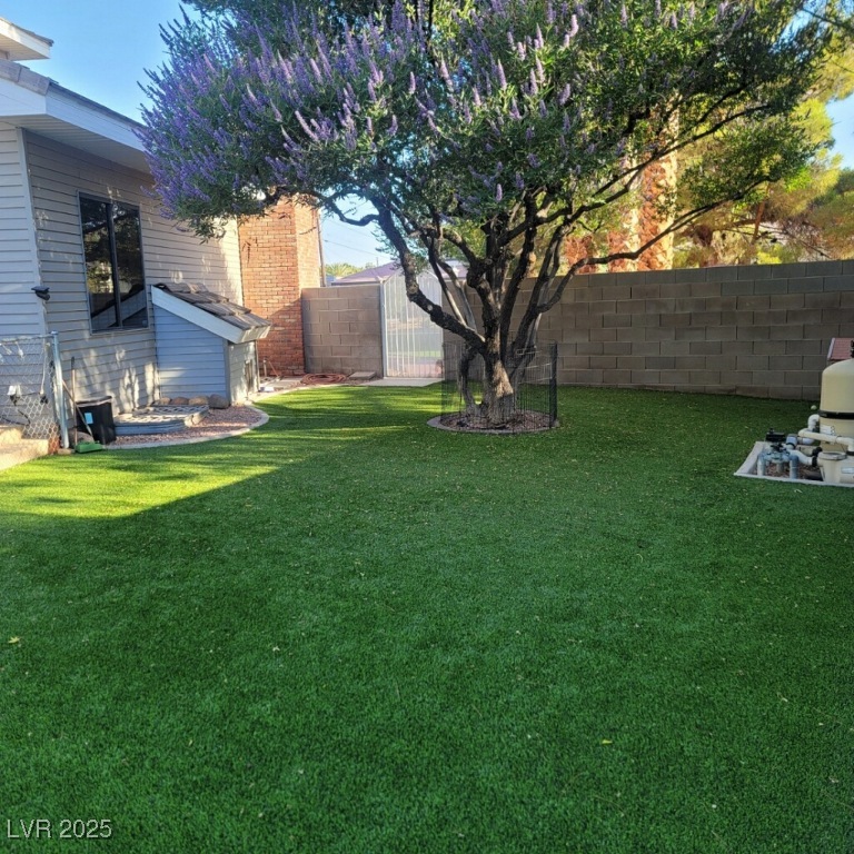 4075 East Oquendo Road Las Vegas, NV 89120 - Photo 51 of 63 Dog run with built in dog house