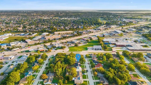 an aerial view of residential building with parking space