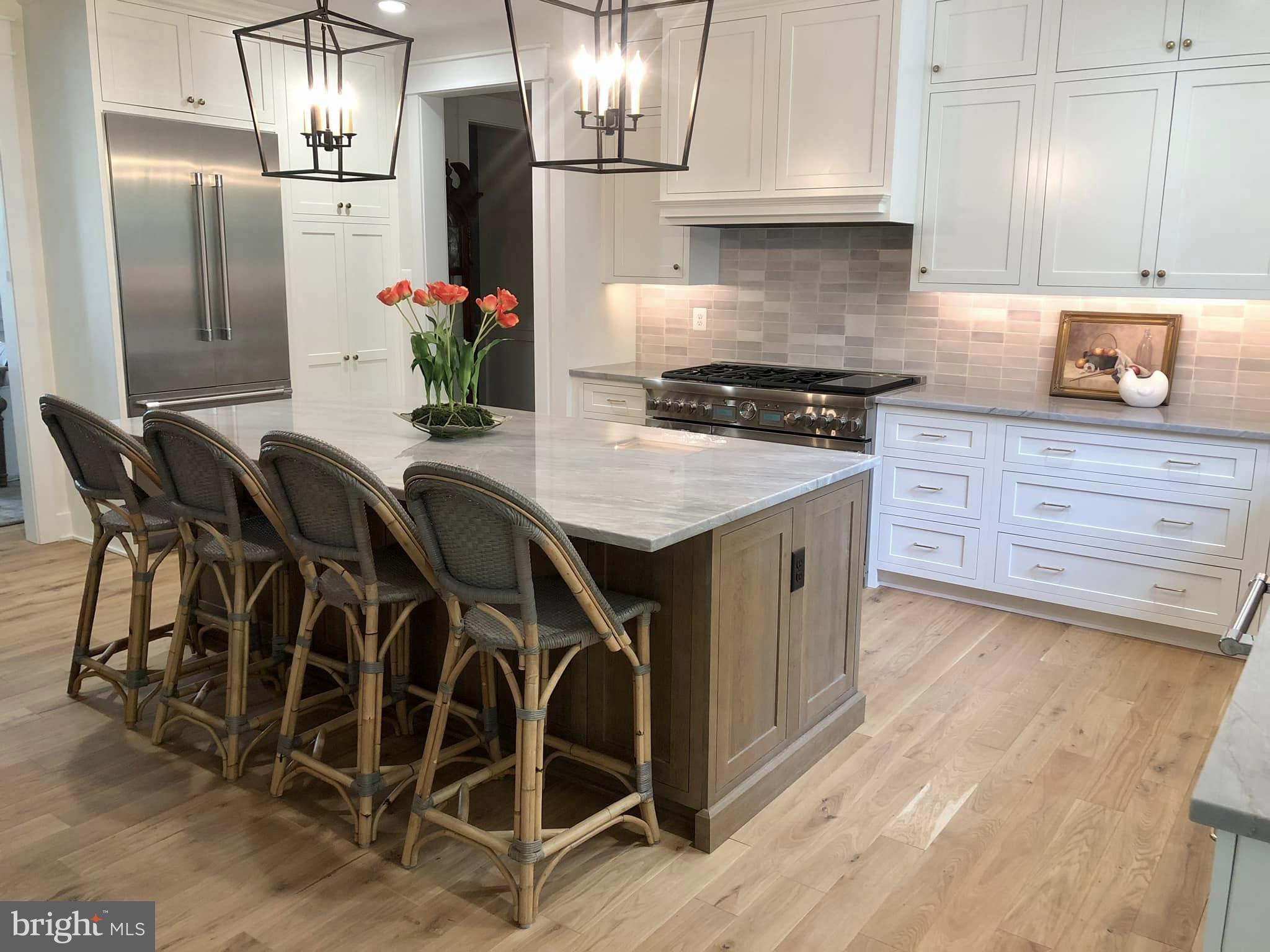 Mountain Church Road Middletown, MD 21769 - Photo 5 of 13 a kitchen with cabinets and chairs