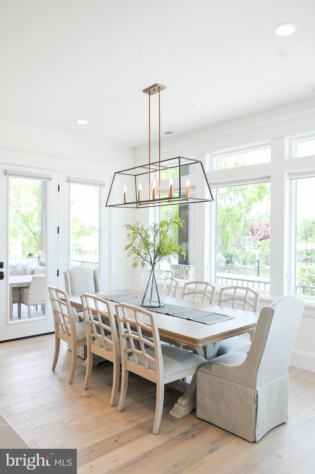 Mountain Church Road Middletown, MD 21769 - Photo 6 of 13 a dining room with furniture a chandelier and wooden floor
