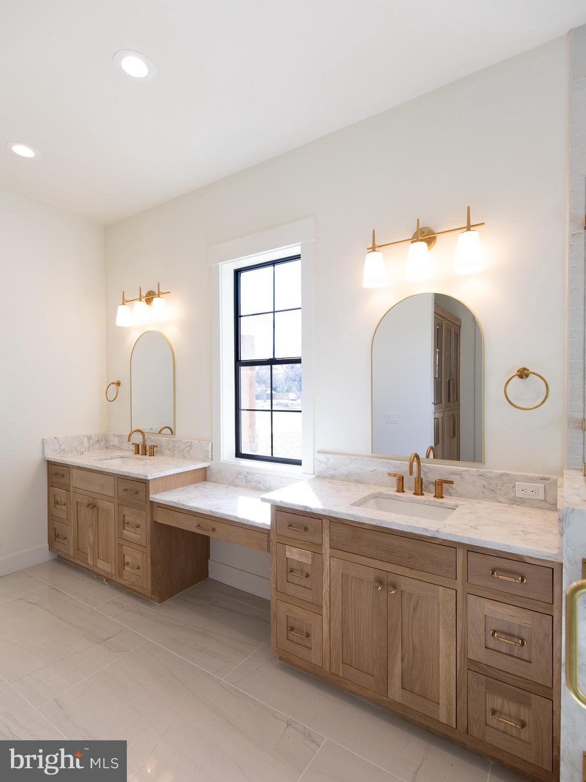 Mountain Church Road Middletown, MD 21769 - Photo 8 of 13 a bathroom with a double vanity sink mirror and bathtub