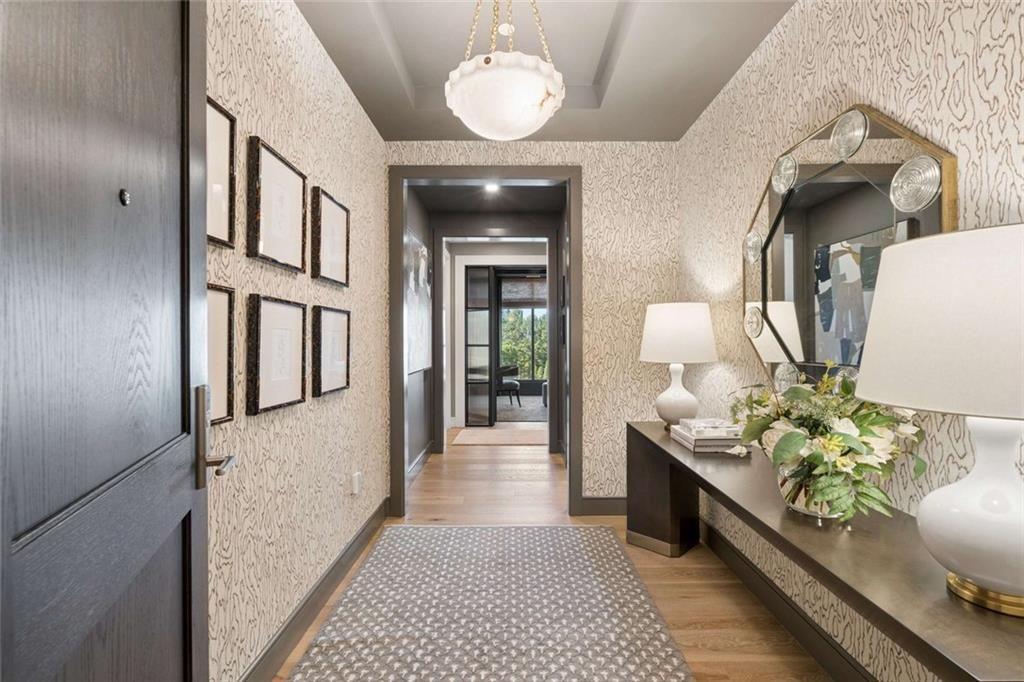 2520 Peachtree Road, Unit 603 Atlanta, GA 30305 - Photo 7 of 91 a hallway with dining table and chairs