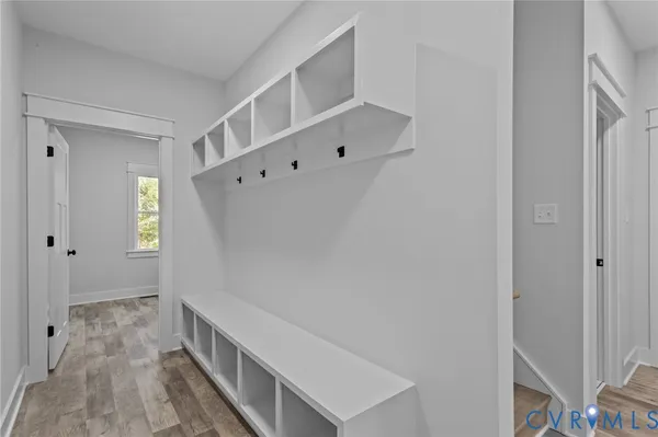 a room that has a window and a table in it