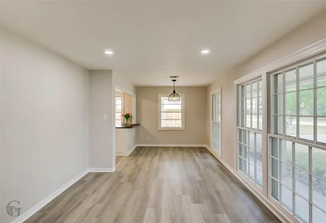 a view of entryway with wooden floor