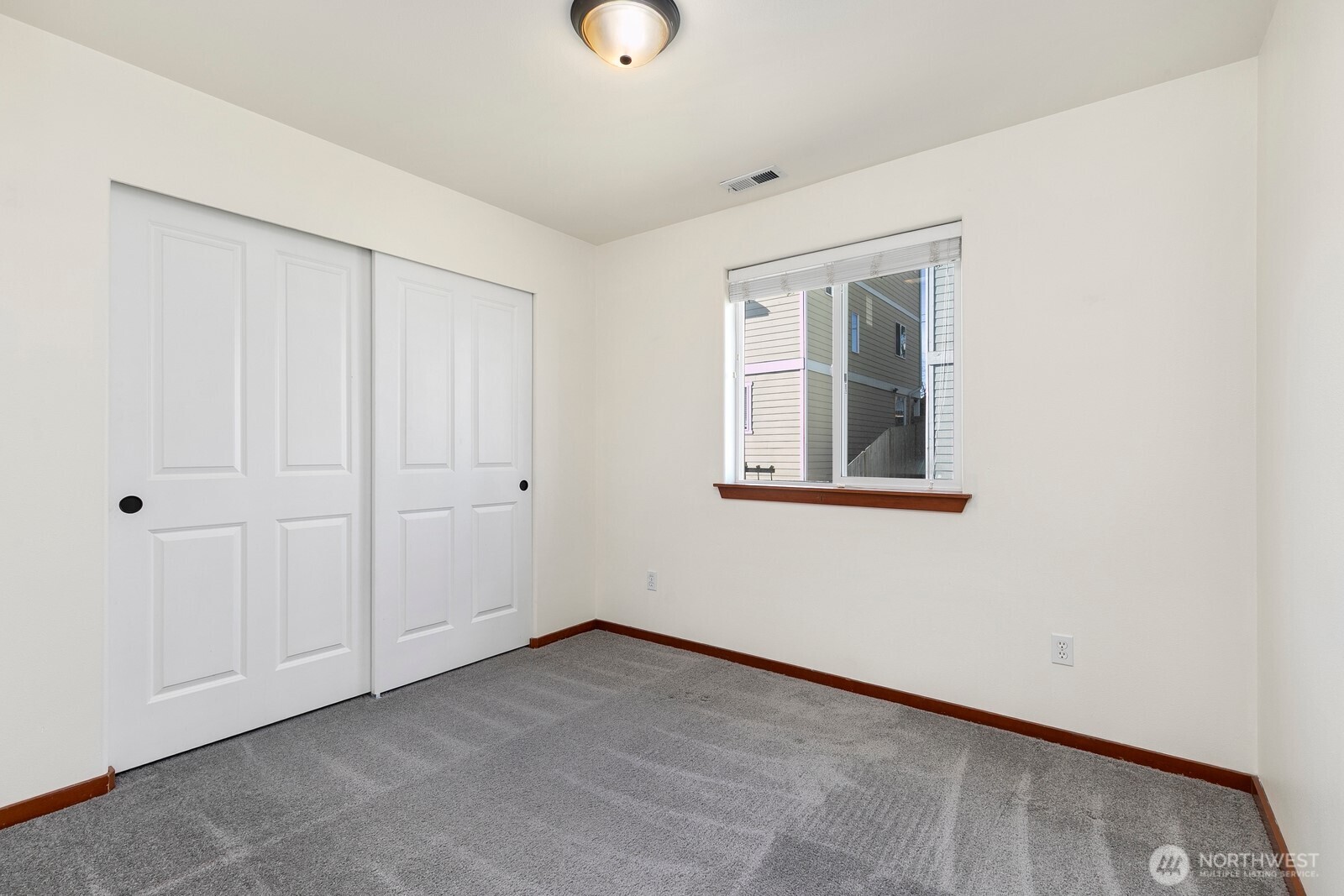 1132 Chestnut Street Everett, WA 98201 - Photo 15 of 24 an empty room with windows