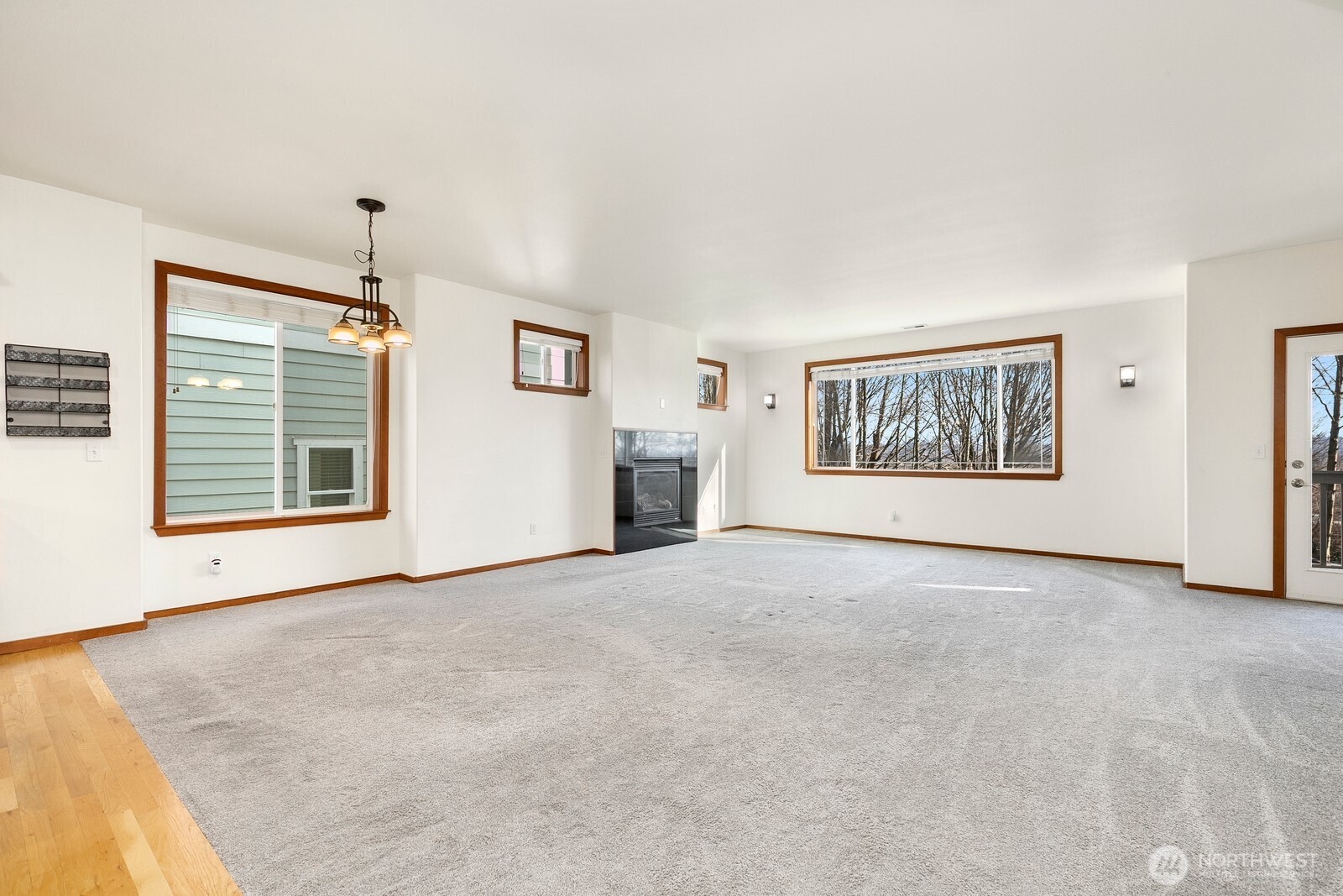 1132 Chestnut Street Everett, WA 98201 - Photo 5 of 24 a view of an empty room with a window and fireplace