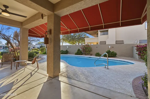 a view of a lake with sitting area