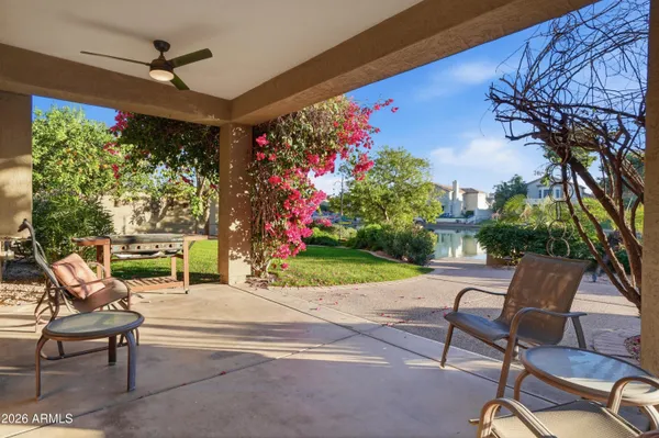 a view of a swimming pool with a patio