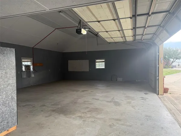 a view of a garage with furniture