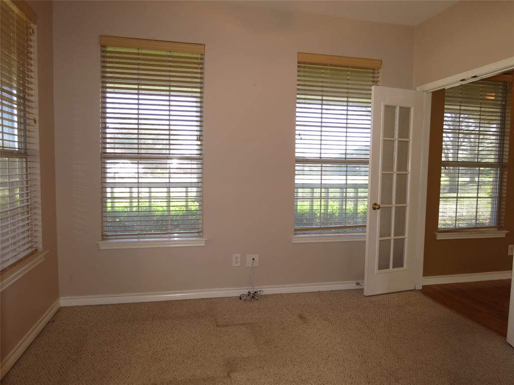 109 Country View Lane Fate, TX 75189 - Photo 7 of 24 an empty room with a window