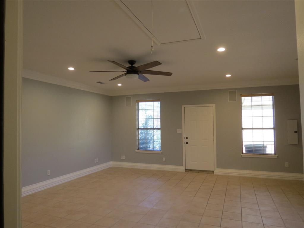 109 Country View Lane Fate, TX 75189 - Photo 9 of 24 a view of an empty room with a window