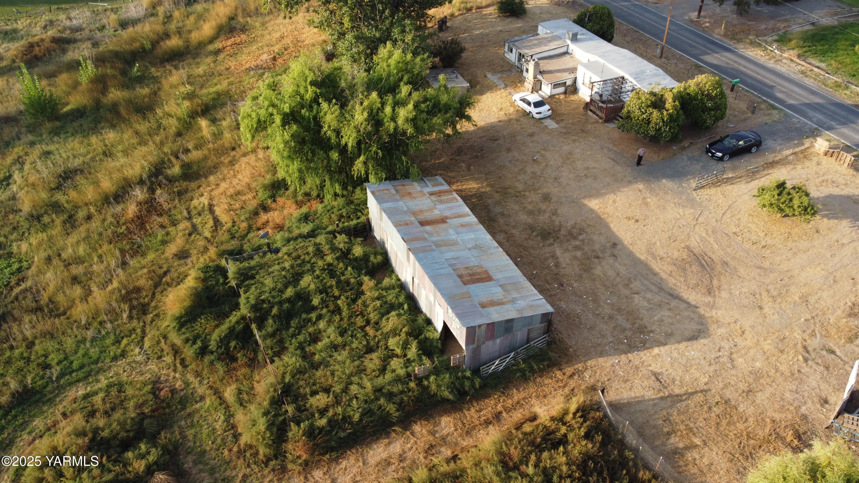 751 Cheyne Road Zillah, WA 98953 - Photo 3 of 8 an aerial view of a house with a yard