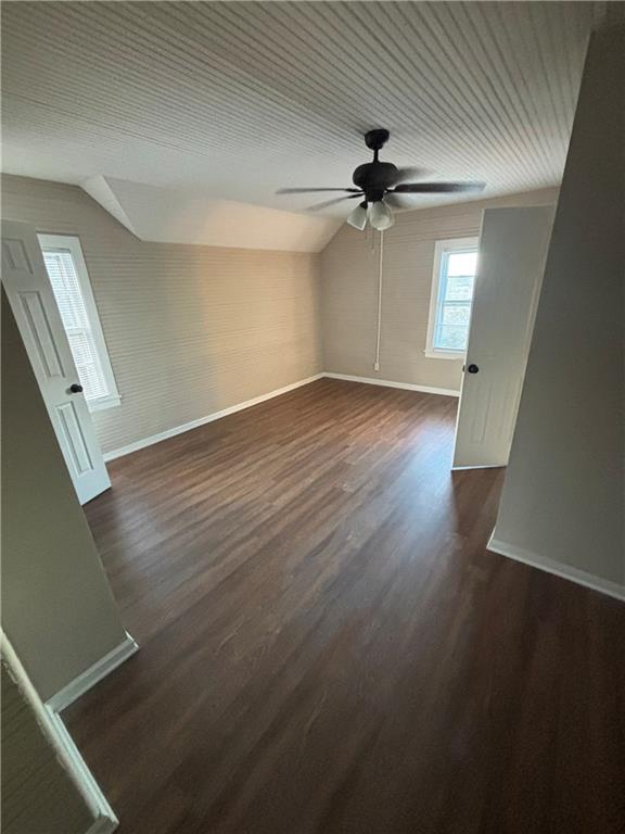 13 Highland Street Gainesville, GA 30501 - Photo 6 of 8 an empty room with wooden floor fan and windows