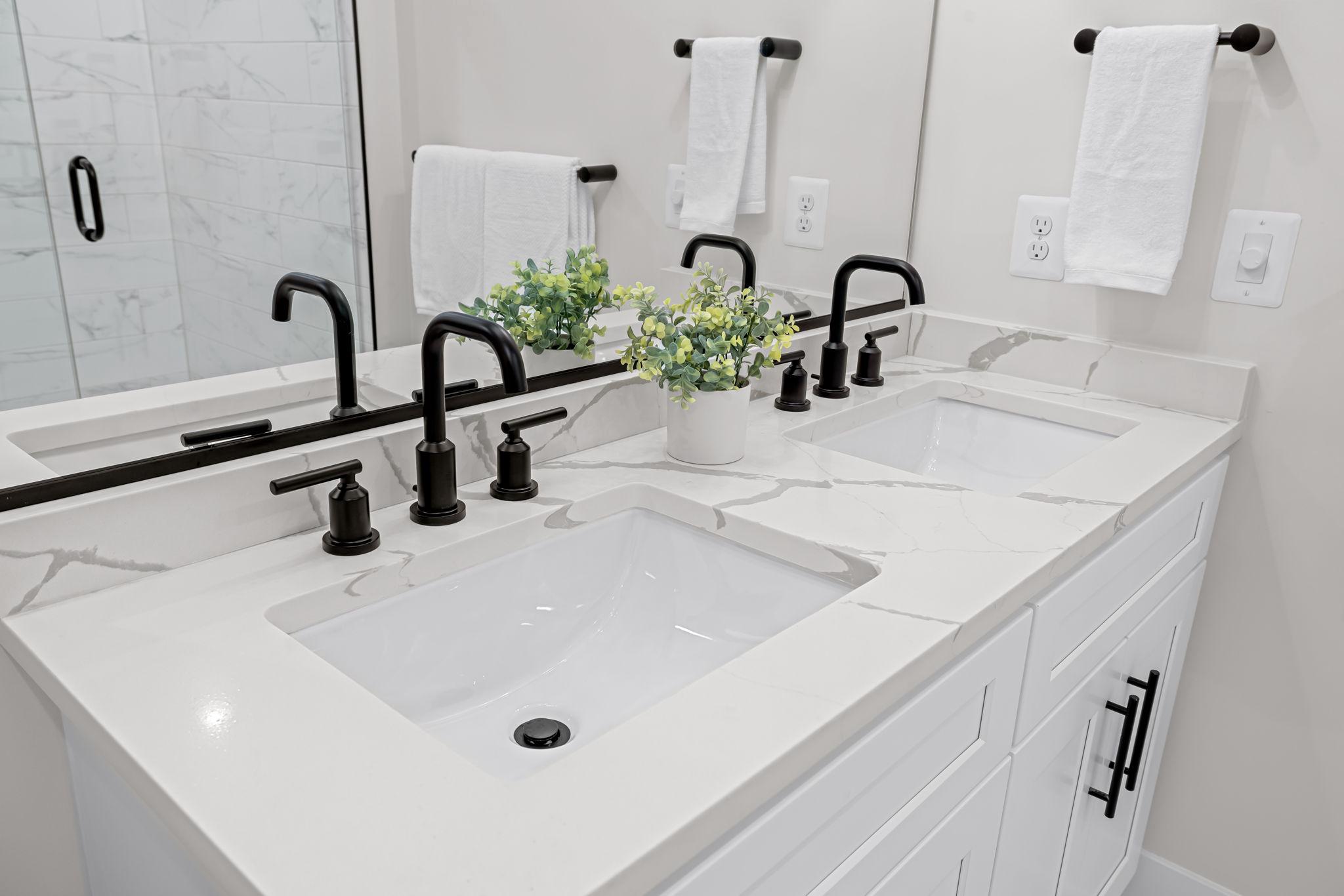 22 South Castle Street Baltimore, MD 21231 - Photo 24 of 32 a bathroom with a double vanity sink